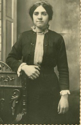 Woman in formal pose in black and white photo